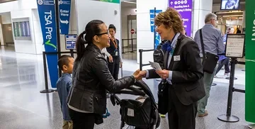 Airport Butler assisting airport passengers