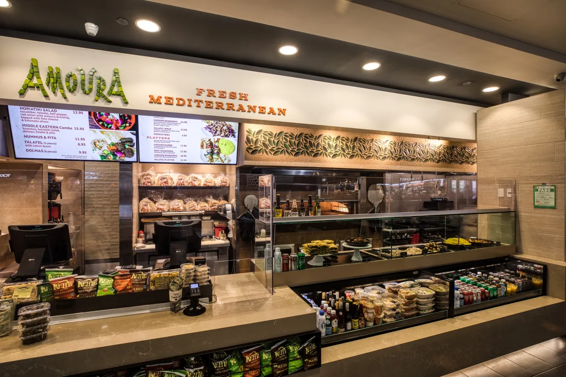 Amoura Cafe counter showing Grab and Go and to-order options.